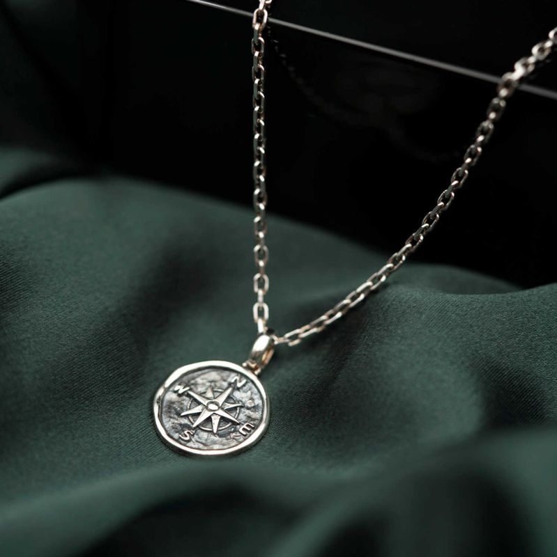 Kompass smykke i sølv